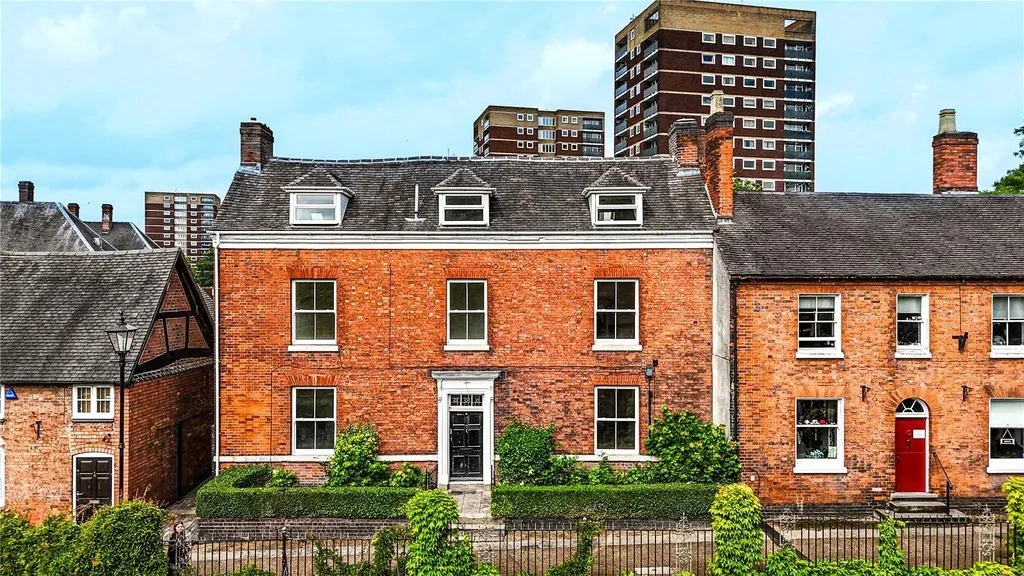 UK freehold apartment block containing several self-contained residential flats.